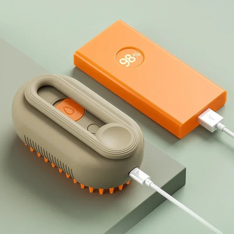 Valley of the Wolves elektrische Haustier-Dampfbürste in Beige und Orange mit USB-Ladekabel zur Fellpflege