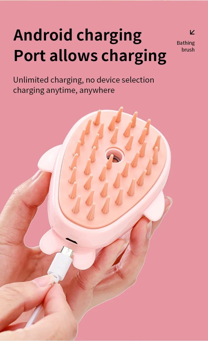 Valley of the Wolves 3-in-1 elektrische Haustier-Dampfbürste in Rosa mit weichen Silikonborsten und USB-Ladeanschluss